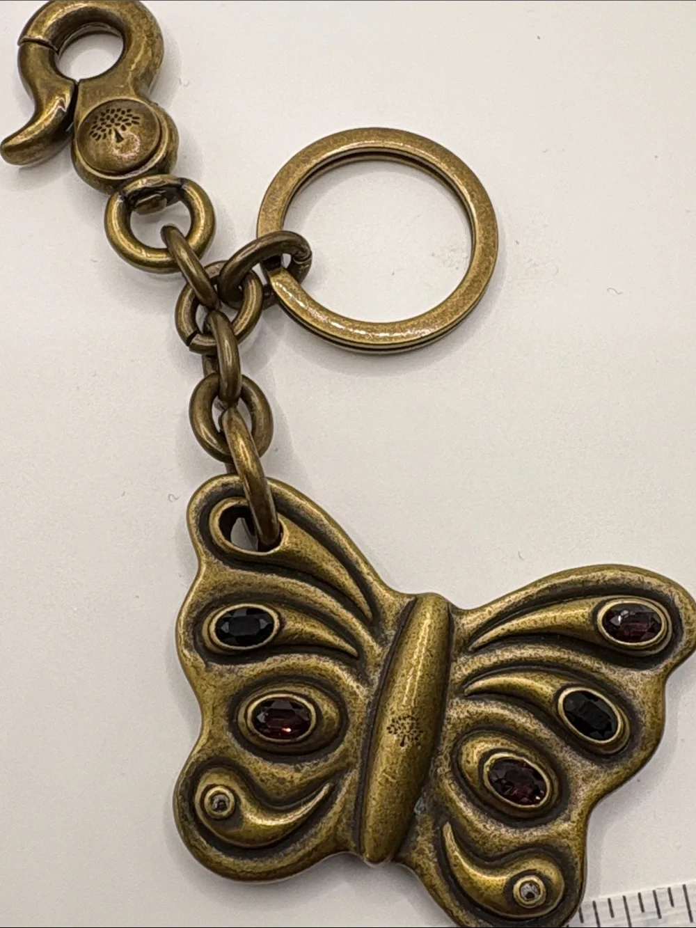 Mulberry Antique Brass Butterfly Keychain with Garnet-Tone Accents
